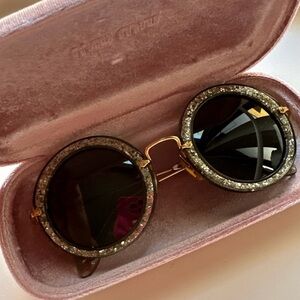 Miu Miu Black and Gold Sunglasses